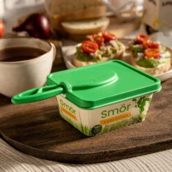 Brelock - A Lid With A Butter Knife